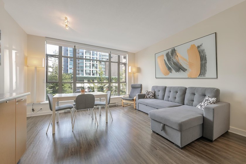 This bright condo offers exceptional value, perfect for savvy - Beach Condo for sale in Vancouver, BC on Beachhouse.com