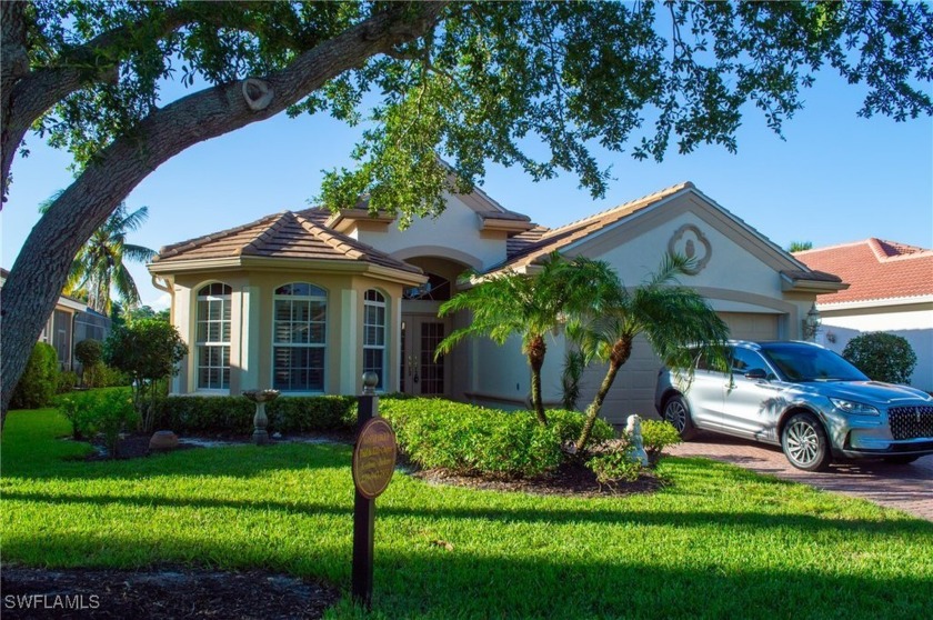 Welcome to your dream home in the prestigious Palmira Golf and - Beach Home for sale in Bonita Springs, Florida on Beachhouse.com