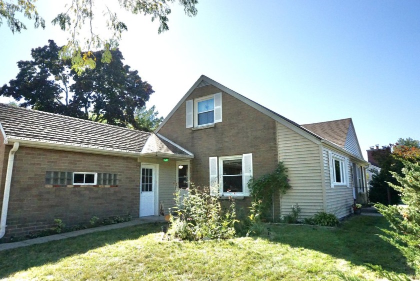 Welcome to this hard-to-find 4-bedroom home ideally situated - Beach Home for sale in Cudahy, Wisconsin on Beachhouse.com