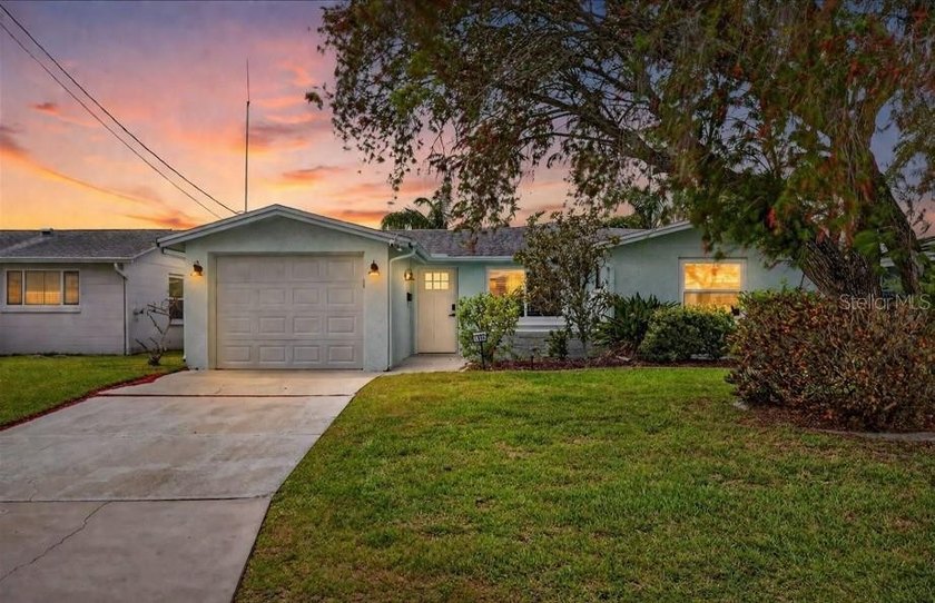 Imagine ending every day with a Gulf sunset in your backyard and - Beach Home for sale in New Port Richey, Florida on Beachhouse.com