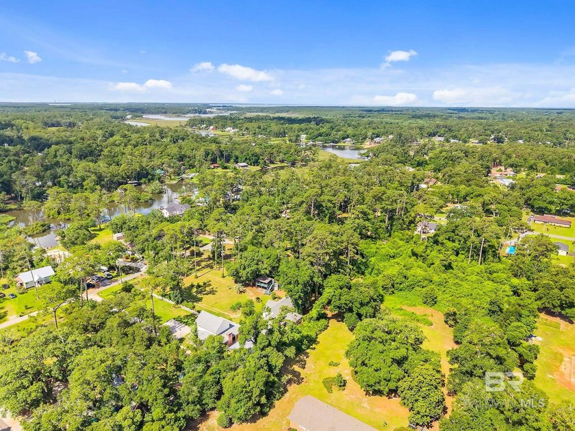 Water Views. Flexibility. Opportunity--Welcome to 7201 Helton Dr - Beach Lot for sale in Foley, Alabama on Beachhouse.com
