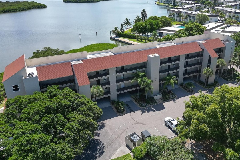 Enjoy unobstructed bay views over the marina and mangrove - Beach Condo for sale in Longboat Key, Florida on Beachhouse.com