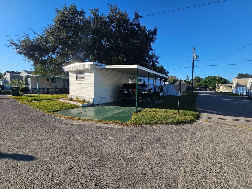 SAWGRASS LAKE ESTATES ALL AGE FAMILY PARK  3035 66TH AVENUE - Beach Home for sale in St. Petersburg, Florida on Beachhouse.com