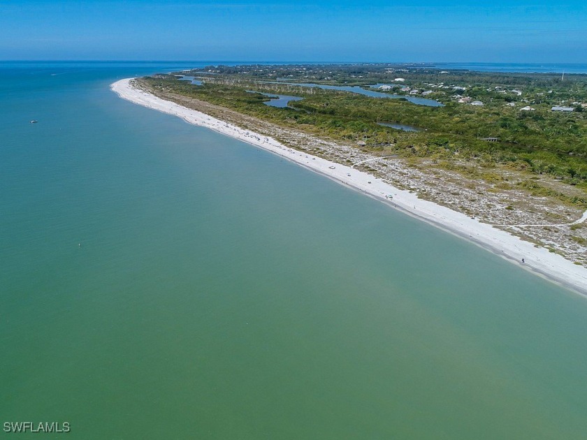 Currently under construction, this ground-floor Blind Pass condo - Beach Condo for sale in Sanibel, Florida on Beachhouse.com