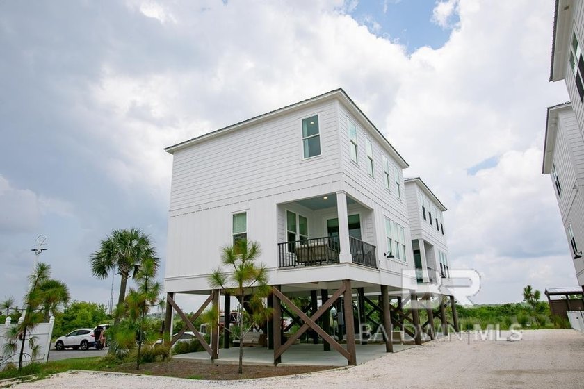 Experience coastal living at its finest with this beautifully - Beach Home for sale in Gulf Shores, Alabama on Beachhouse.com