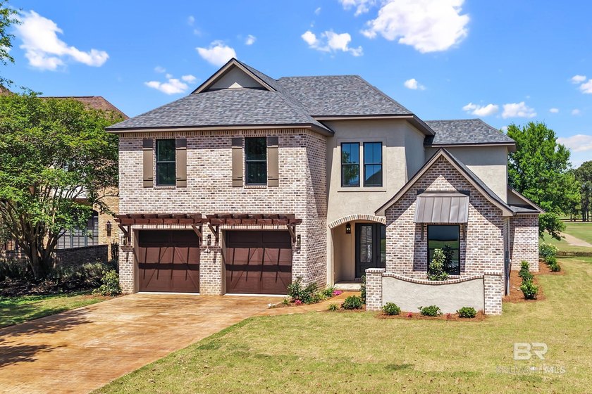 This beautifully crafted new construction Gold Fortified full - Beach Home for sale in Gulf Shores, Alabama on Beachhouse.com