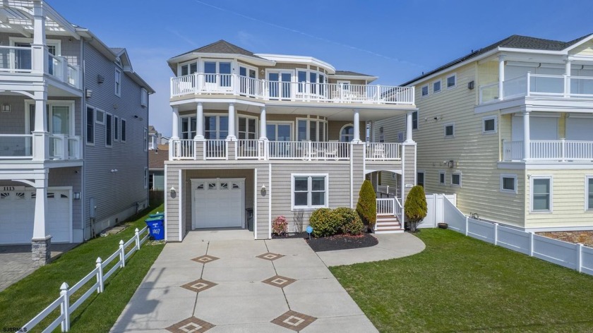 Introducing an unparalleled beachfront haven in the exclusive A - Beach Home for sale in Brigantine, New Jersey on Beachhouse.com