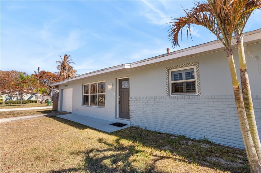 Coastal living in a prime location! Situated in a highly - Beach Home for sale in Indian Harbour Beach, Florida on Beachhouse.com