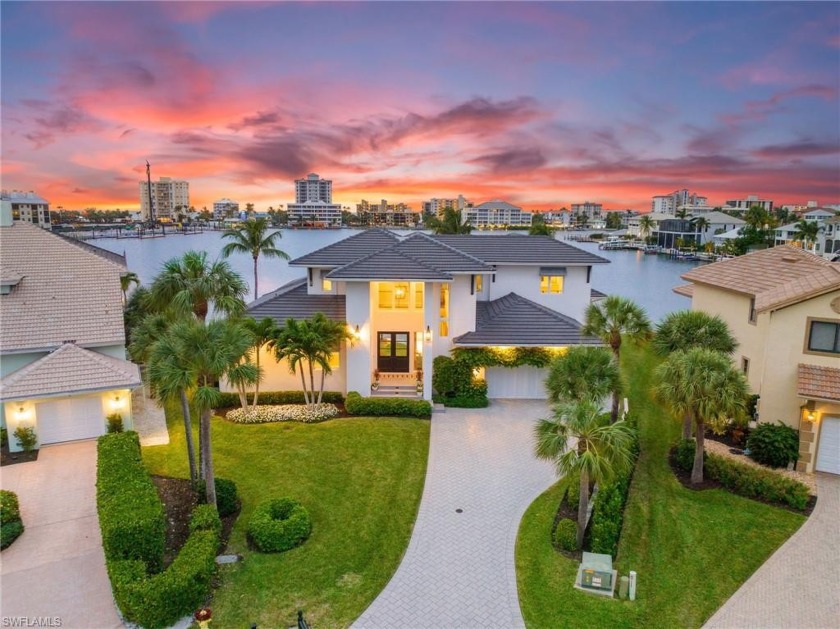 Set against the back drop of dazzling wide-water views of - Beach Home for sale in Naples, Florida on Beachhouse.com