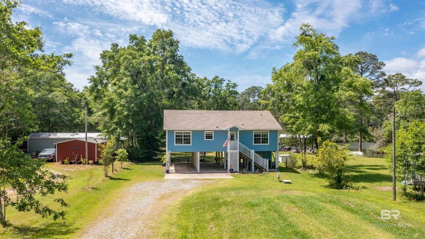 Charming waterfront cottage nestled in the Miflin community of - Beach Home for sale in Elberta, Alabama on Beachhouse.com