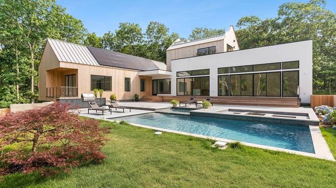 Set in the privacy of Hither Woods, this six bedroom, five and a - Beach Home for sale in Montauk, New York on Beachhouse.com