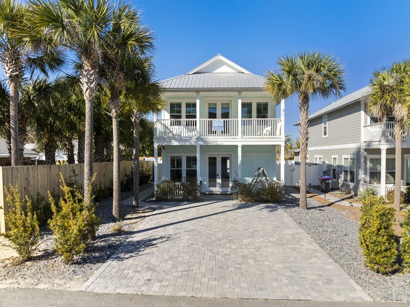 Designed for effortless coastal living & outdoor enjoyment, this - Beach Home for sale in Panama City Beach, Florida on Beachhouse.com