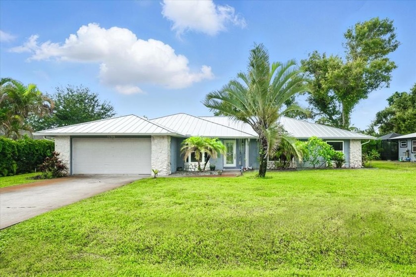 Meticulously Maintained CBS Home with Modern Upgrades in Holiday - Beach Home for sale in Fort Pierce, Florida on Beachhouse.com