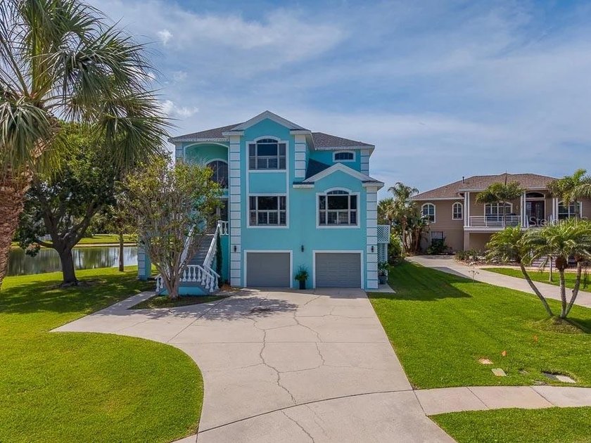 Welcome to 2106 Pelican Court, an exceptional residence located - Beach Home for sale in Tarpon Springs, Florida on Beachhouse.com