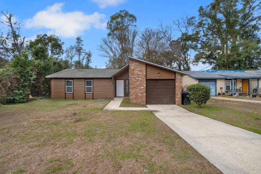 Move-in ready and minutes from it all, this updated 3BR/2BA home - Beach Home for sale in Tallahassee, Florida on Beachhouse.com