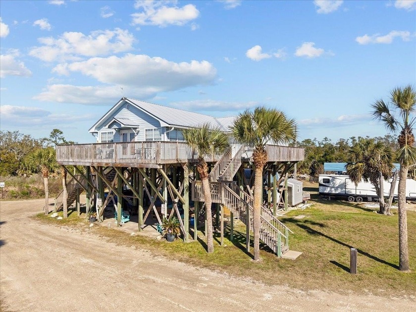 GULF-FRONT MOTEL / FISHING LODGE with wide-open marsh views and - Beach Lot for sale in Perry, Florida on Beachhouse.com