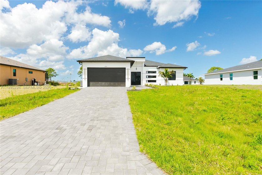 Enjoy this gorgeous new construction home in Cape Coral with no - Beach Home for sale in Cape Coral, Florida on Beachhouse.com