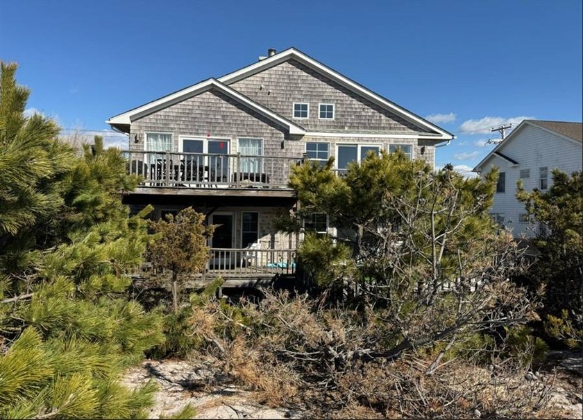 A rare opportunity to own a stunning oceanfront beach house set - Beach Home for sale in Cherry Grove, New York on Beachhouse.com