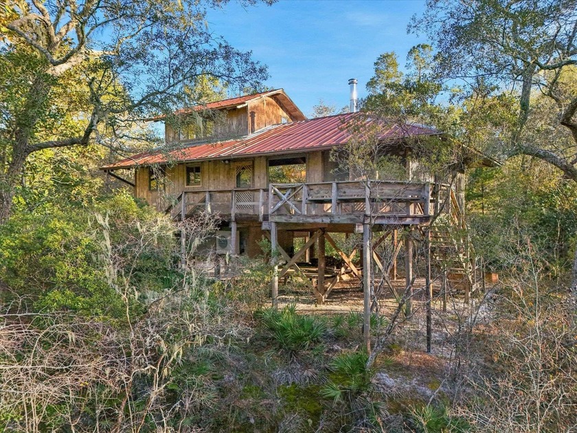 Welcome home to this Sopchoppy river getaway. 1.89 acres - Beach Home for sale in Sopchoppy, Florida on Beachhouse.com