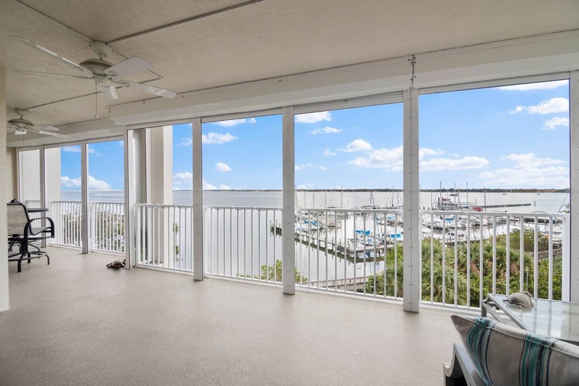 This stunning corner condominium with expansive wraparound - Beach Condo for sale in Cocoa, Florida on Beachhouse.com