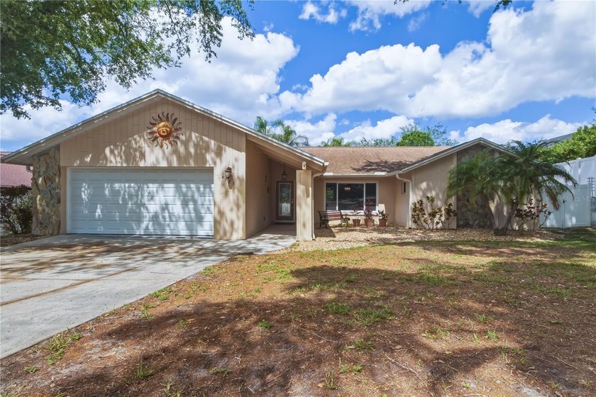 Lake Valencia in Palm Harbor! 3 bedrooms, 2 full baths, 2 car - Beach Home for sale in Palm Harbor, Florida on Beachhouse.com