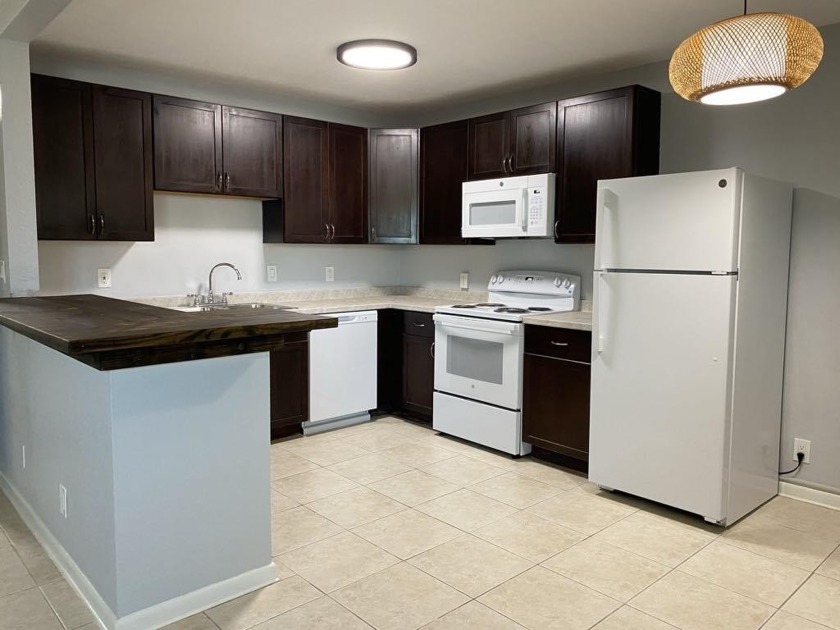 This first-floor 2-bedroom condo has been beautifully renovated - Beach Condo for sale in Lake Park, Florida on Beachhouse.com