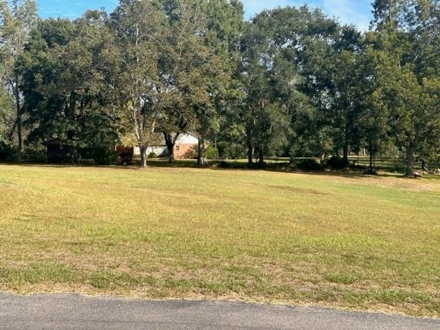 This almost one-acre lot is located in the serene and - Beach Lot for sale in Grand Bay, Alabama on Beachhouse.com