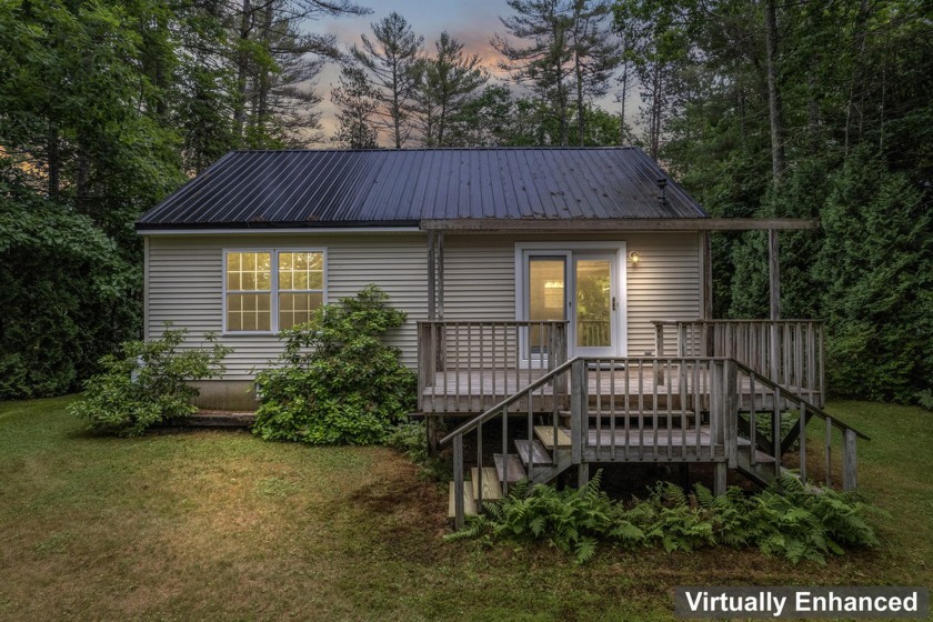 Perched on the edge of the Megunticook River with a sweeping - Beach Home for sale in Camden, Maine on Beachhouse.com