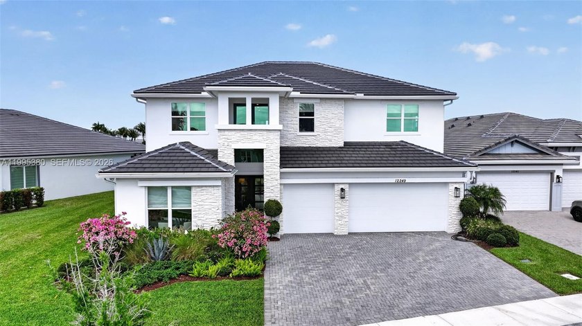 Modern Design. Elevated Finishes. A Standout in Avenir. Welcome - Beach Home for sale in Palm Beach Gardens, Florida on Beachhouse.com