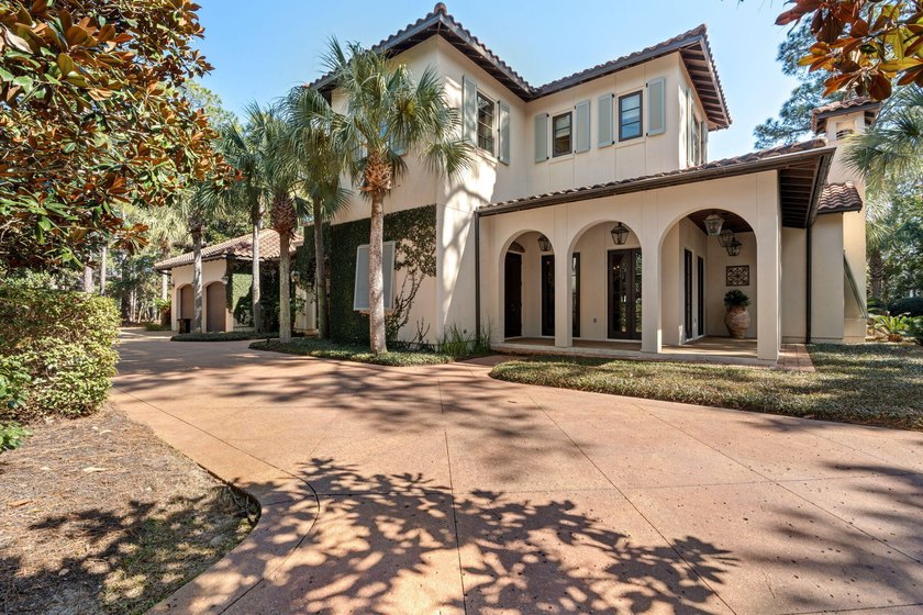Tucked behind beautiful, private gates on a desirable corner lot - Beach Home for sale in Miramar Beach, Florida on Beachhouse.com