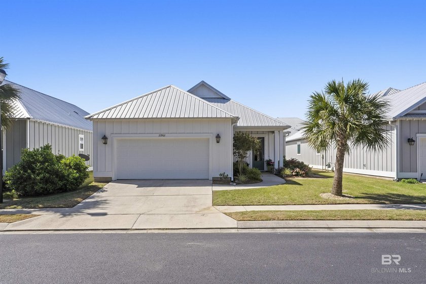 Welcome to this beautifully maintained 3-bedroom, 2.5-bath home - Beach Home for sale in Orange Beach, Alabama on Beachhouse.com