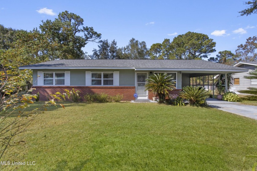 This charming Ranch-style home is in the resurgent neighborhood - Beach Home for sale in Ocean Springs, Mississippi on Beachhouse.com