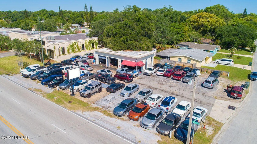 Located in the heart of Daytona Beach. This two bay garage and - Beach Commercial for sale in Daytona Beach, Florida on Beachhouse.com