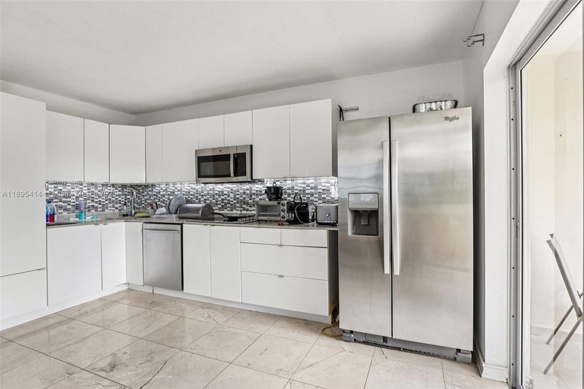 Experience unparalleled coastal living in this fully remodeled - Beach Condo for sale in Miami Beach, Florida on Beachhouse.com