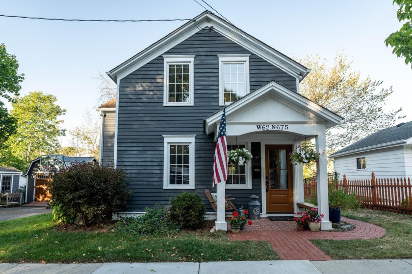 This downtown, creek-side, 1900 home has original charm coupled - Beach Home for sale in Cedarburg, Wisconsin on Beachhouse.com