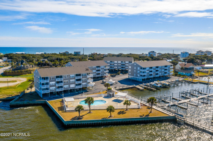 Don't miss out on a rare top-floor, end unit in sound front - Beach Condo for sale in Salter Path, North Carolina on Beachhouse.com