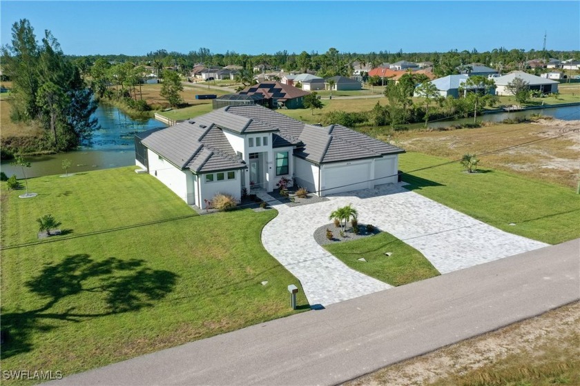 This gorgeous 3-bedroom, 3 bathroom sanctuary in quiet Northwest - Beach Home for sale in Cape Coral, Florida on Beachhouse.com