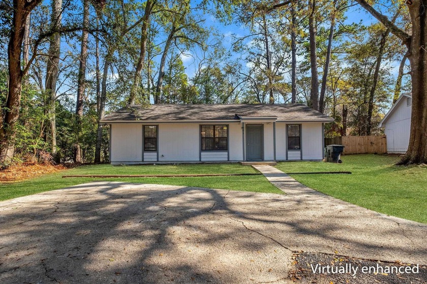Move-in ready and minutes from it all, this updated 3BR/2BA home - Beach Home for sale in Tallahassee, Florida on Beachhouse.com