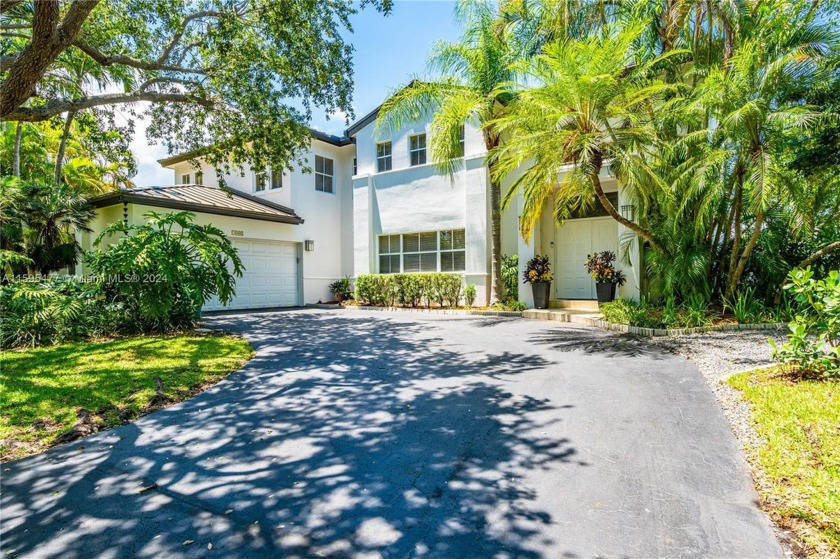 Rarely available canal front residence nestled within the gated - Beach Home for sale in Palmetto Bay, Florida on Beachhouse.com