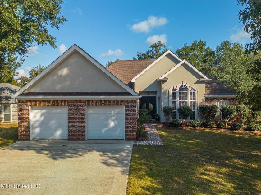 Elegant 3 Bedroom/2 full bath ADORABLE home nestled in - Beach Home for sale in Diamondhead, Mississippi on Beachhouse.com