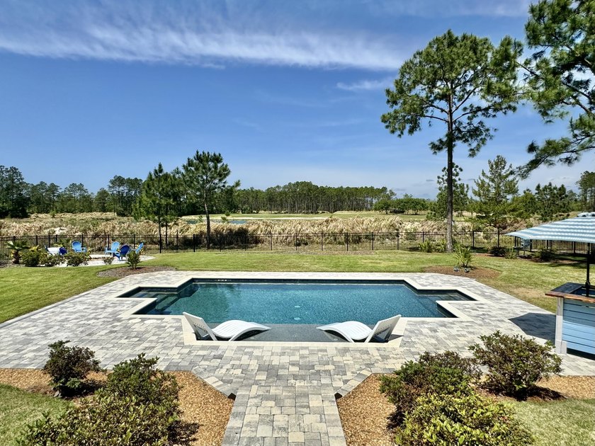 Welcome to this beautifully designed 2020-built home situated on - Beach Home for sale in Freeport, Florida on Beachhouse.com