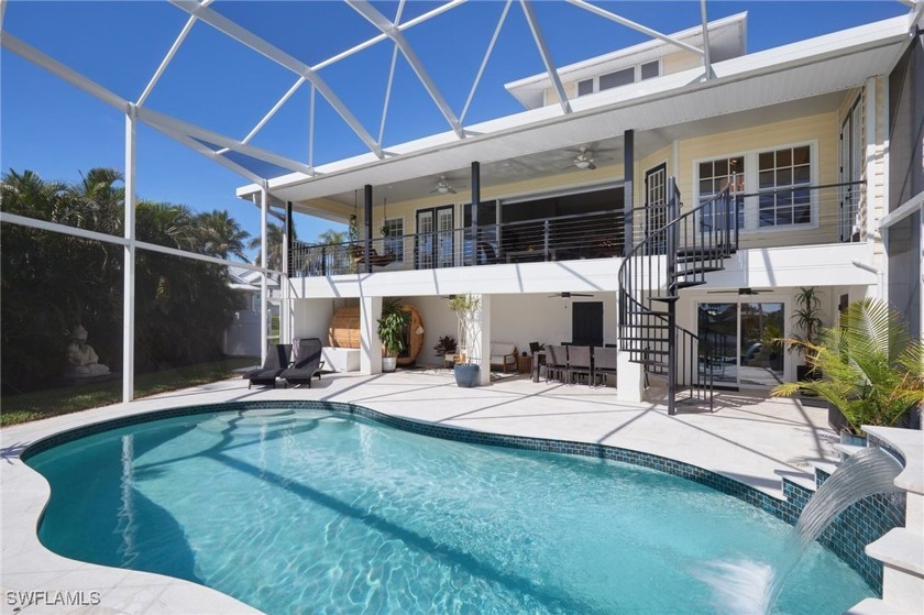 This stunning split-level home offers the perfect blend of style - Beach Home for sale in Fort Myers, Florida on Beachhouse.com