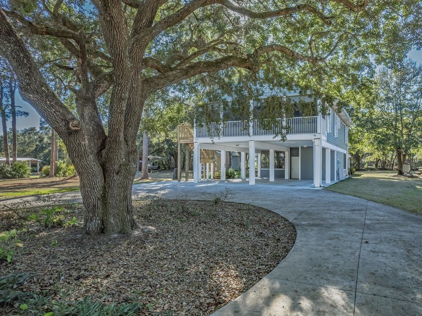 Stunning Concrete-Piling Beach-Style Home on 2 Acres.This - Beach Home for sale in Carabelle, Florida on Beachhouse.com