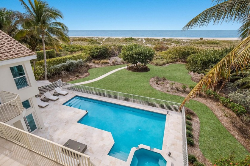 Experience the pinnacle of coastal luxury at this magnificent 4 - Beach Home for sale in Longboat Key, Florida on Beachhouse.com