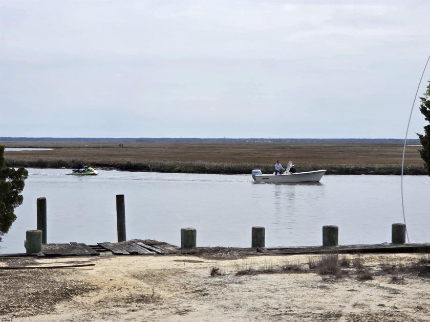 Build your dream waterfront retreat on this prime lot featuring - Beach Lot for sale in Little Egg Harbor, New Jersey on Beachhouse.com