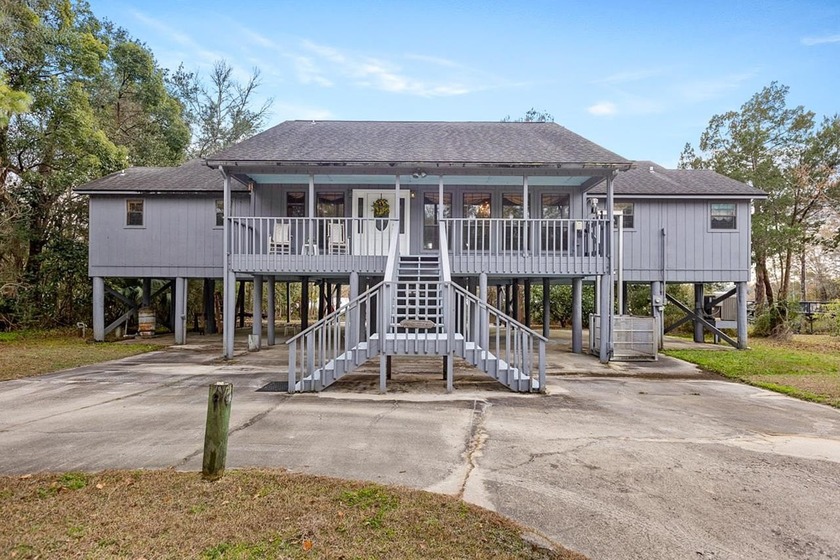 Welcome to peaceful waterfront living on the scenic Ochlockonee - Beach Home for sale in Sopchoppy, Florida on Beachhouse.com