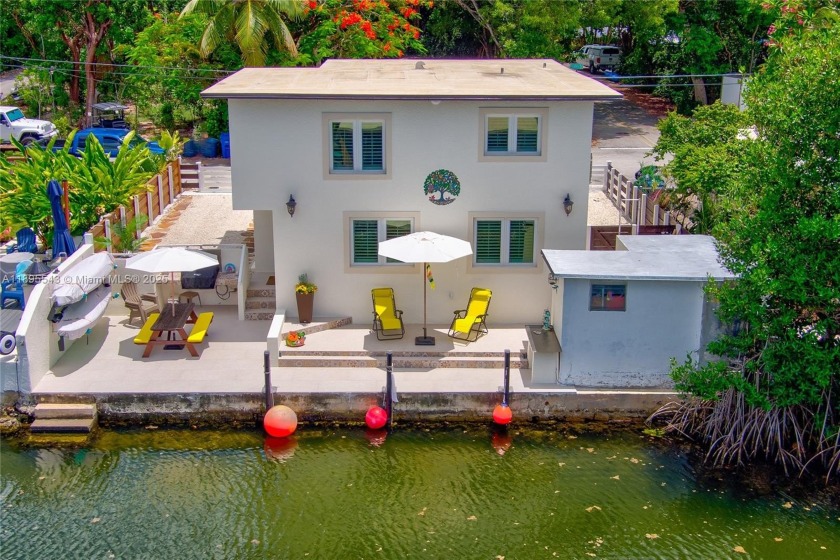 Tropical Paradise Awaits! Step into island living with this - Beach Home for sale in Key Largo, Florida on Beachhouse.com