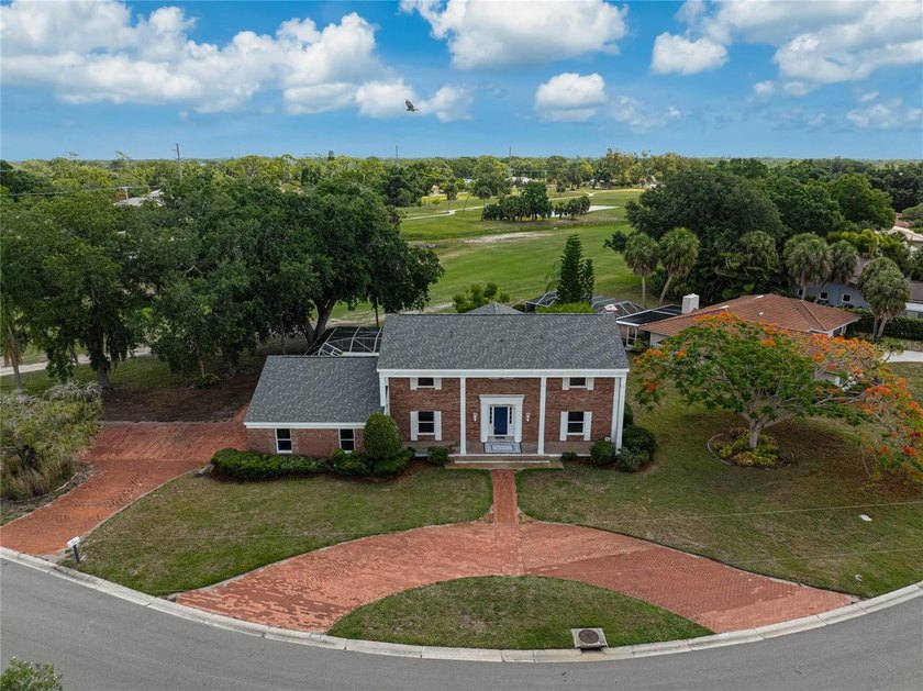 Classic Estate-Style Home with Pool & Golf Course Views!
 - Beach Home for sale in Sarasota, Florida on Beachhouse.com