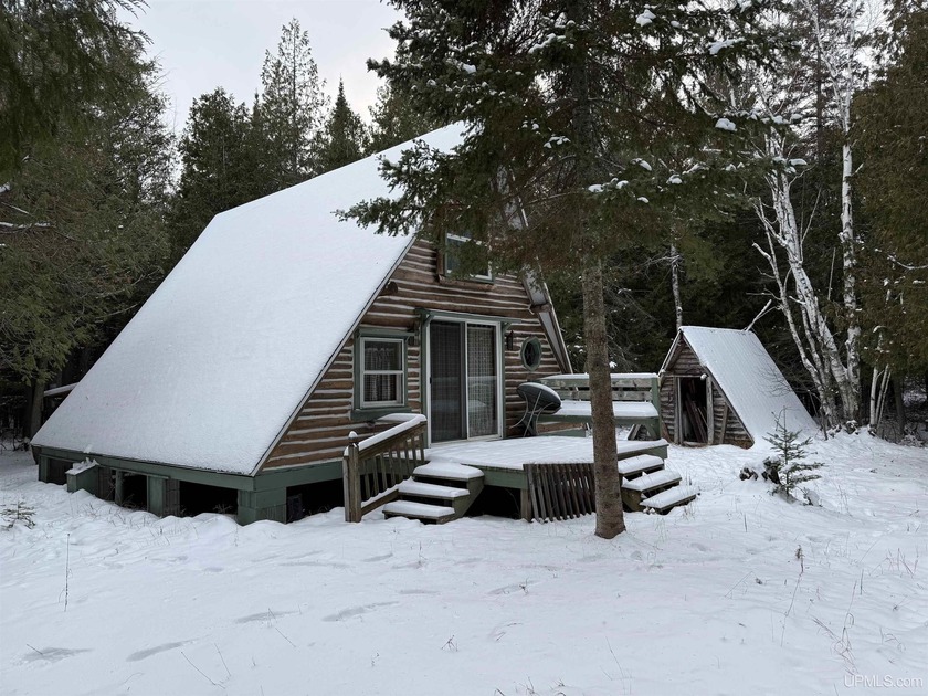 Beautifully wooded 12.5-acre parcel with a small A-frame located - Beach Home for sale in Garden, Michigan on Beachhouse.com