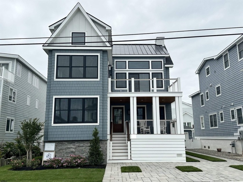 Welcome to 711 Beach Drive, an exclusive bayfront masterpiece - Beach Home for sale in North Cape May, New Jersey on Beachhouse.com